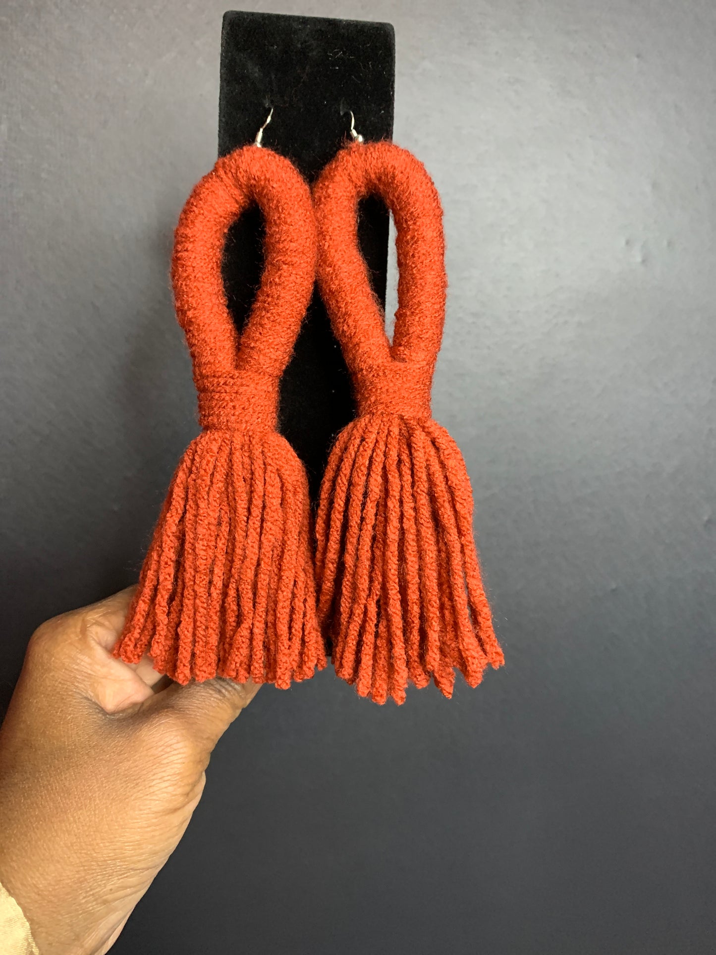 Yarn earrings orange